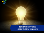 na ciemnym tle świecąca żarówka na dole napis bon energetyczny gdzie złożyć wniosek